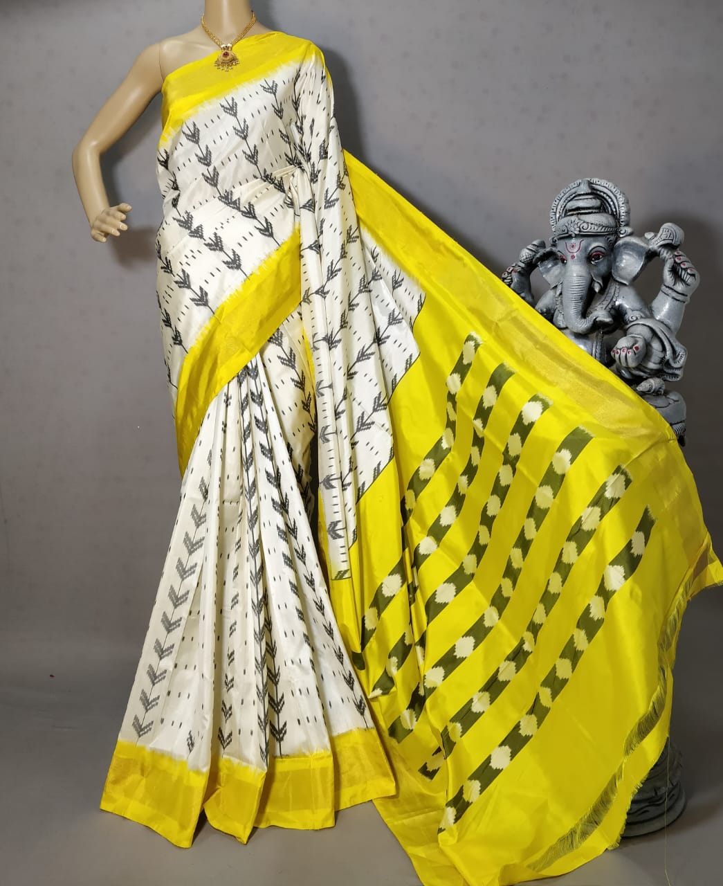 Cream with yellow border Pochampally ikkat silk saree