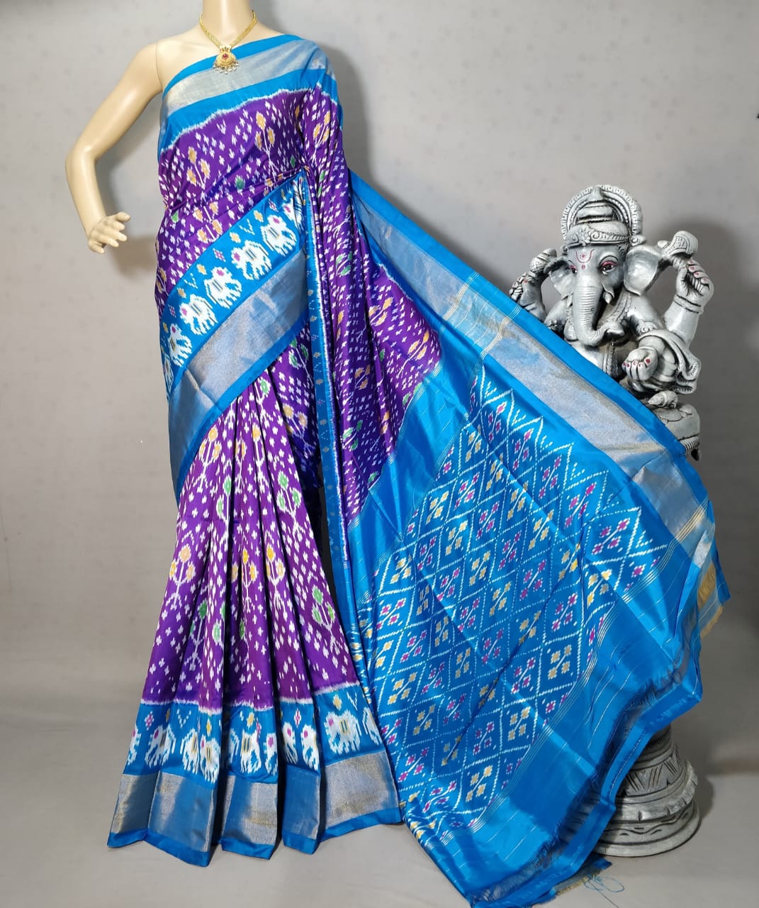 Purple with blue border Pochampally ikkat silk saree