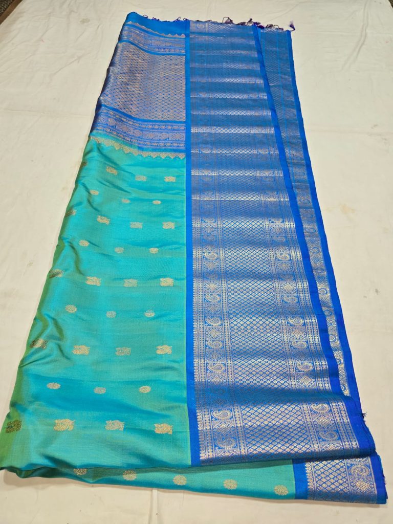 Sea green with Blue border in small Butta Pure Gadwa silk saree