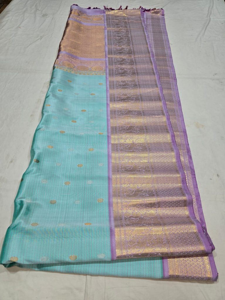 Sky blue with purple border in small Butta Pure Gadwa silk saree