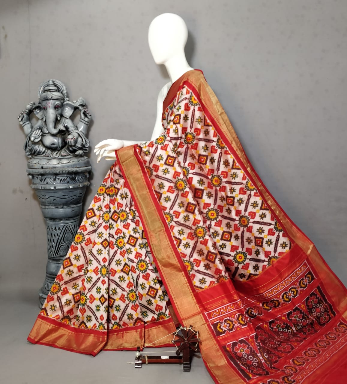 white with Red geometric pattern Pochampally ikkat silk saree